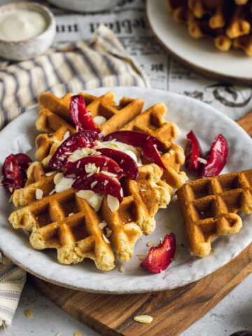 vegan condensed milk waffles on a white plate