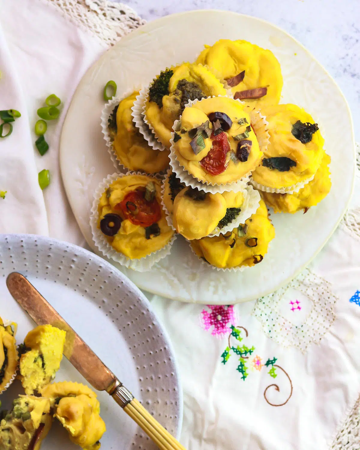 A plate full of vegan mini frittatas on a table