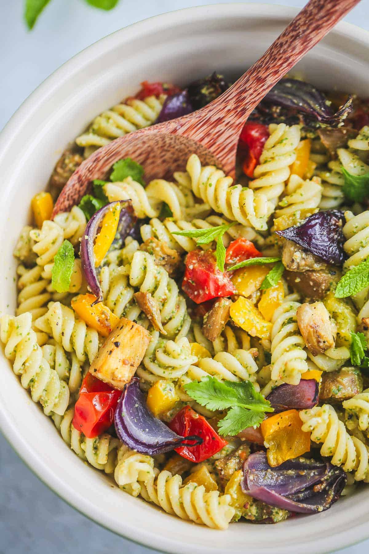 a bowl filled with vegan pasta salad