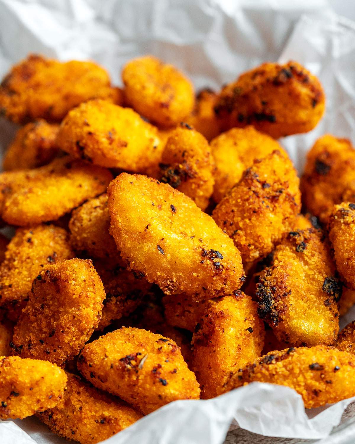 Close up of a bowl filled with vegan air fryer gnocchi.