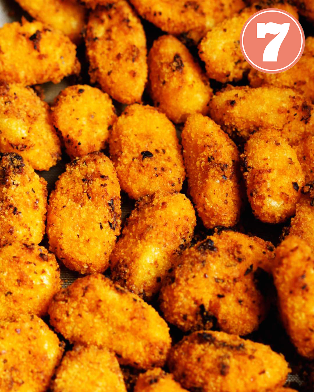 Close up of air fried gnocchi in air fryer.