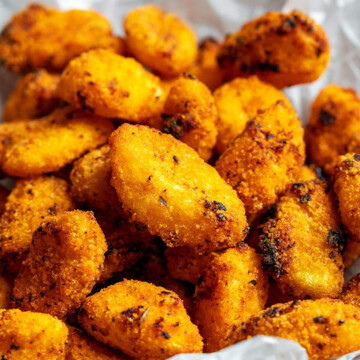 close up of crispy air fryer gnocchi in a bowl.