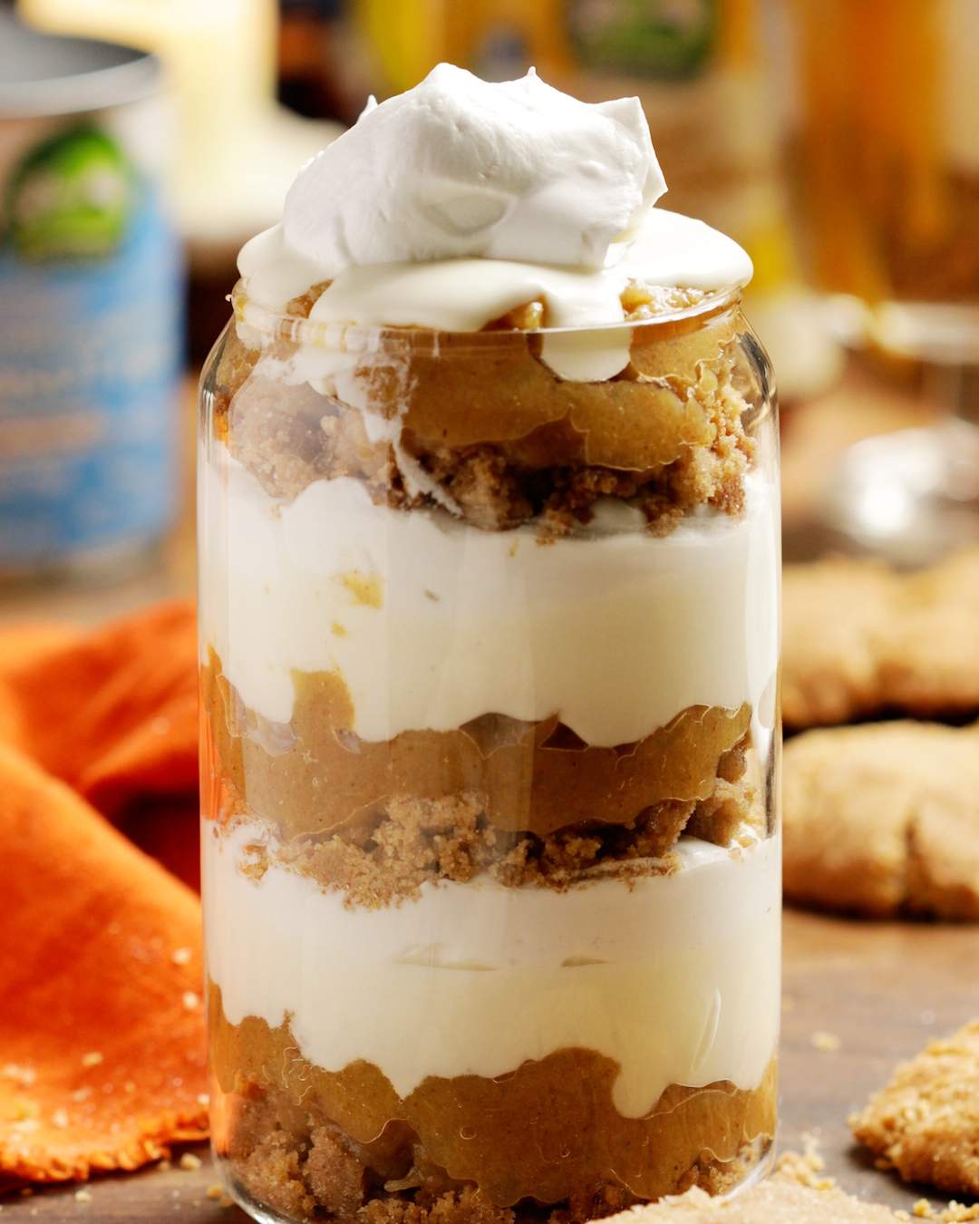 Apple Parfait layered in a dessert jar with coconut cream on top.