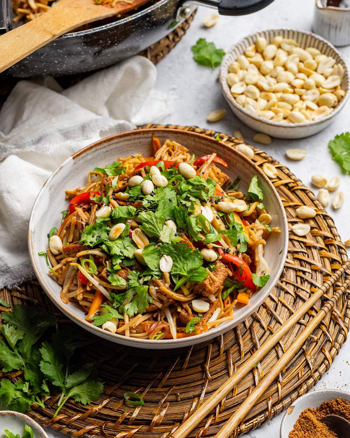 Vegan Pad Thai in a bowl on the dinner table.