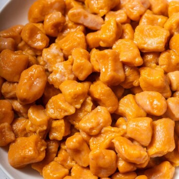 Freshly cooked sweet potato gnocchi on a plate.