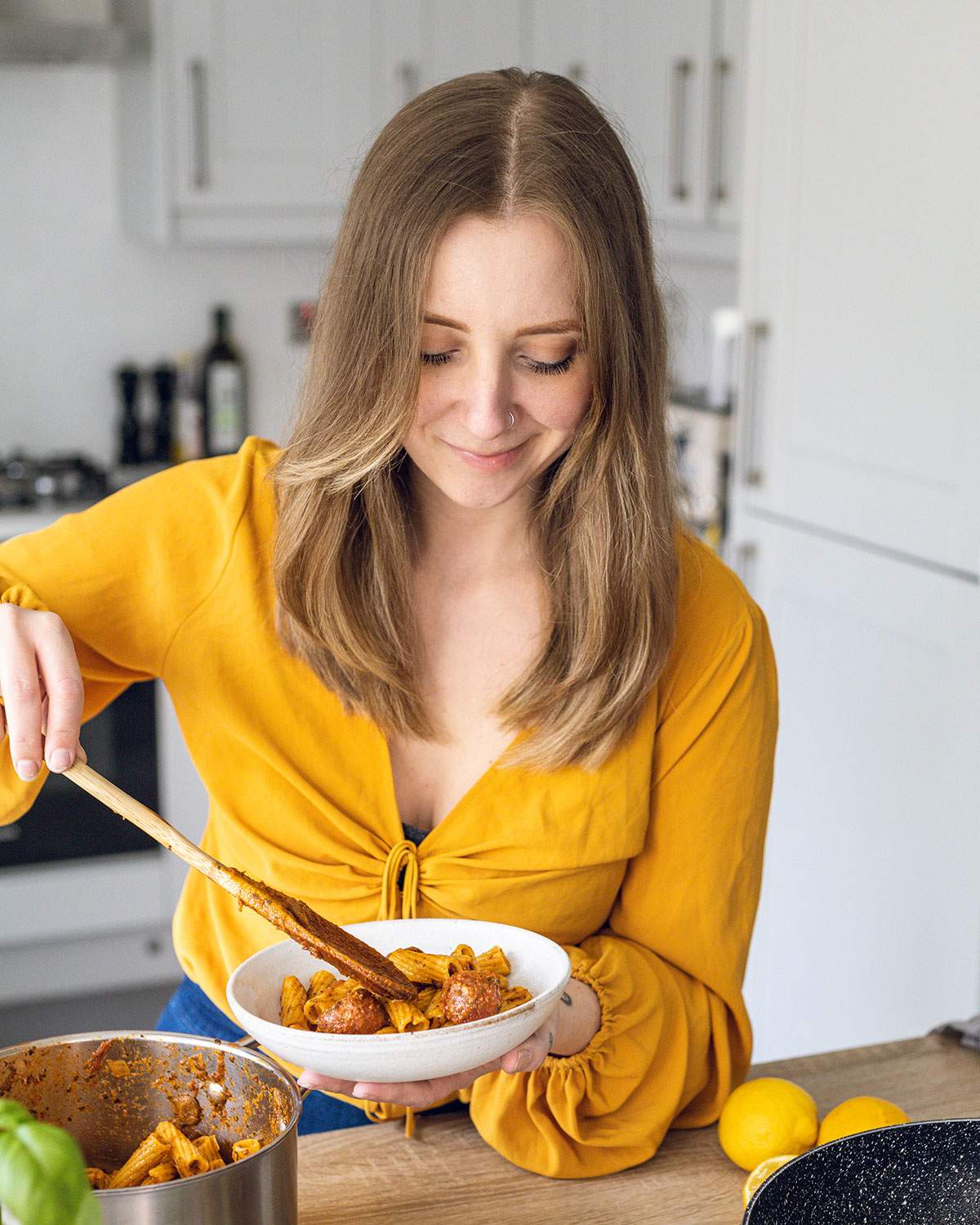 Food Blogger and Photographer Romy London dishing up a recipe in the kitchen.