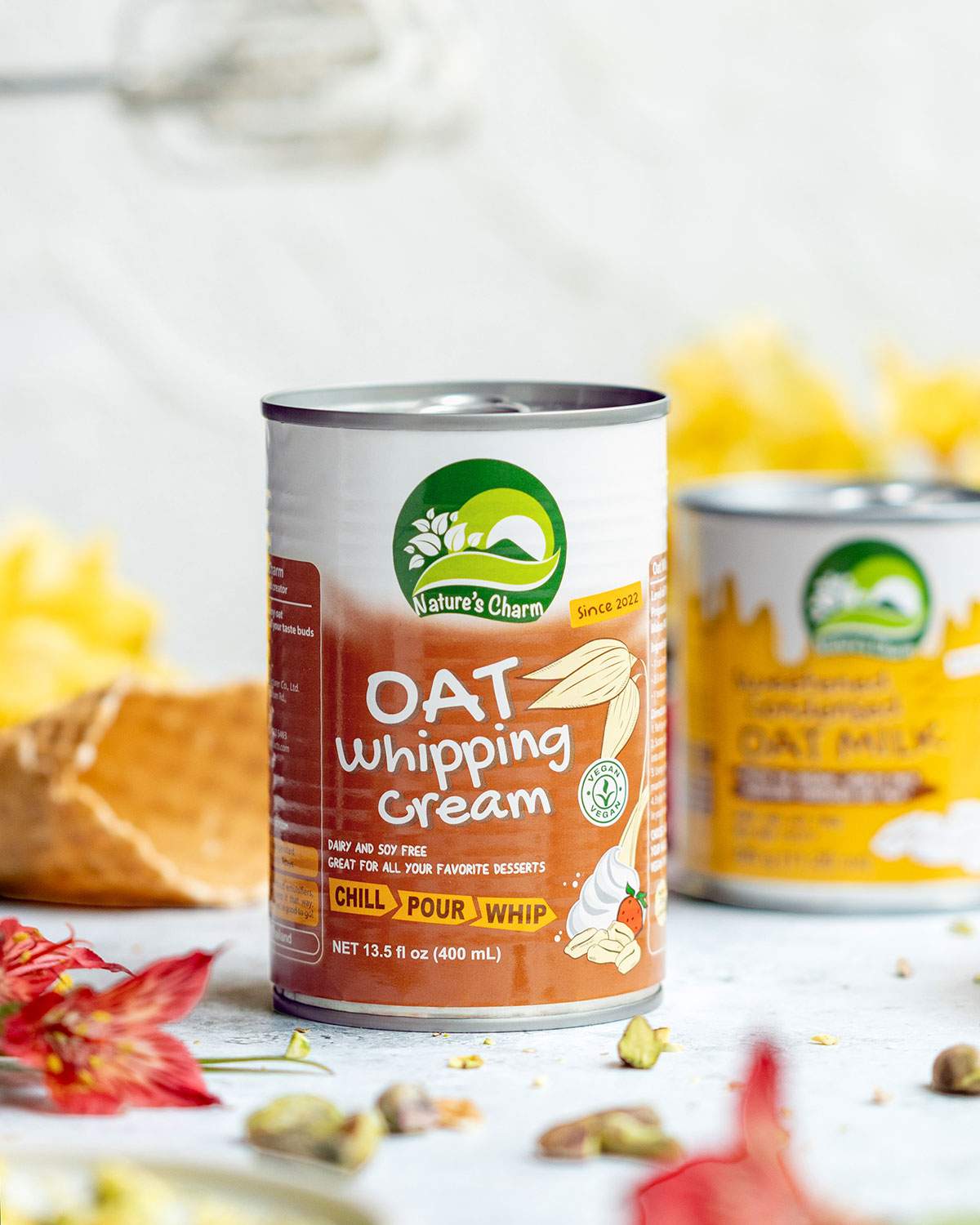 A can of oat whipping cream on a table.
