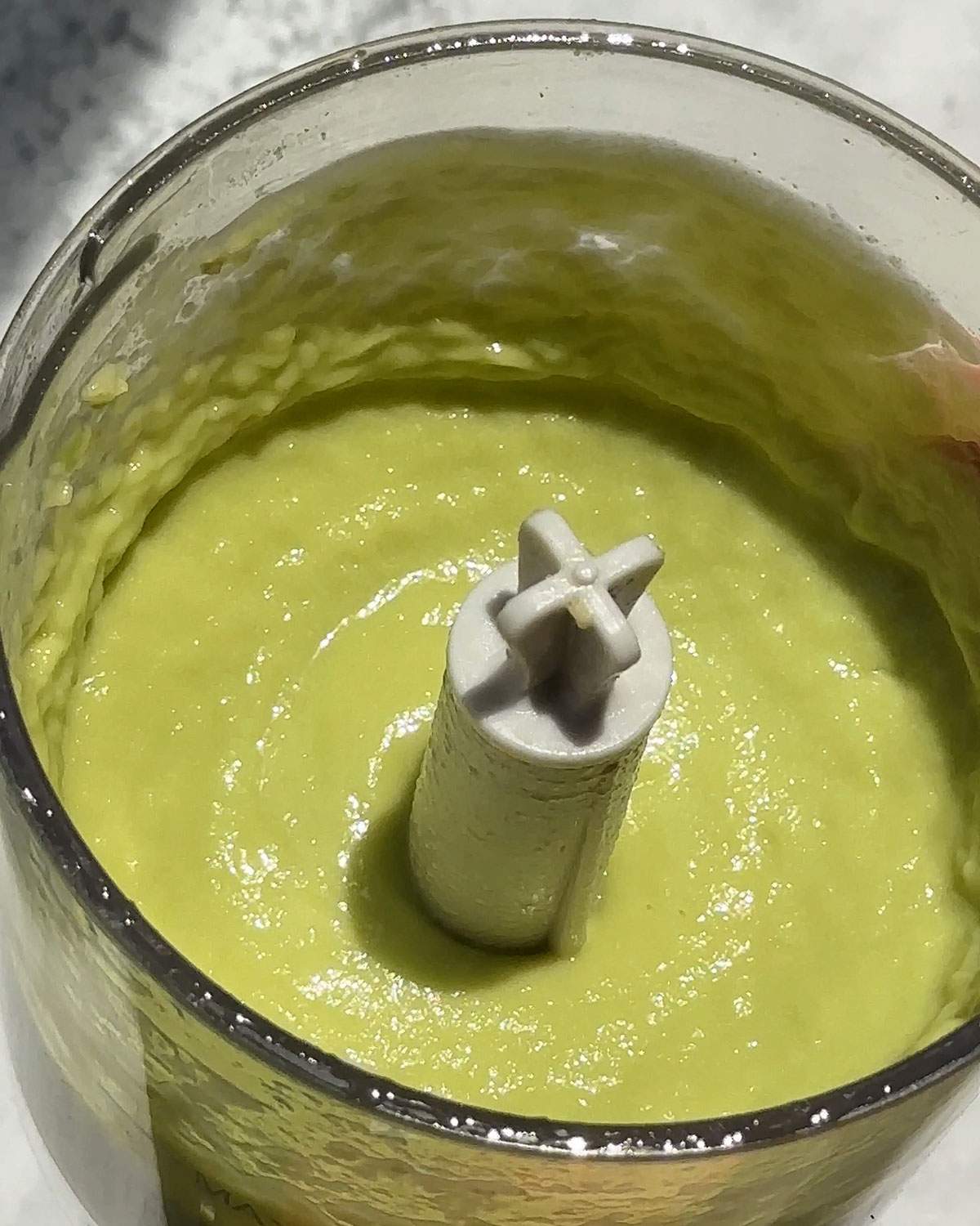Smooth Avocado crema in a blender.
