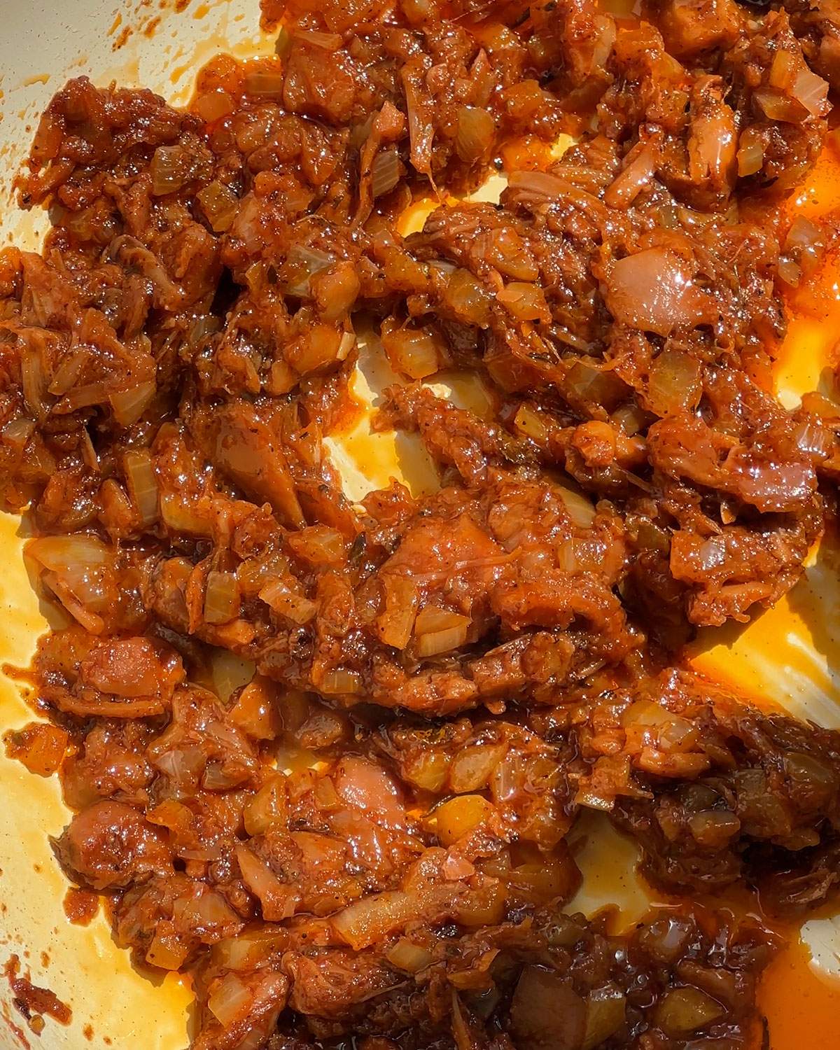 Cooked jackfruit in a skillet.