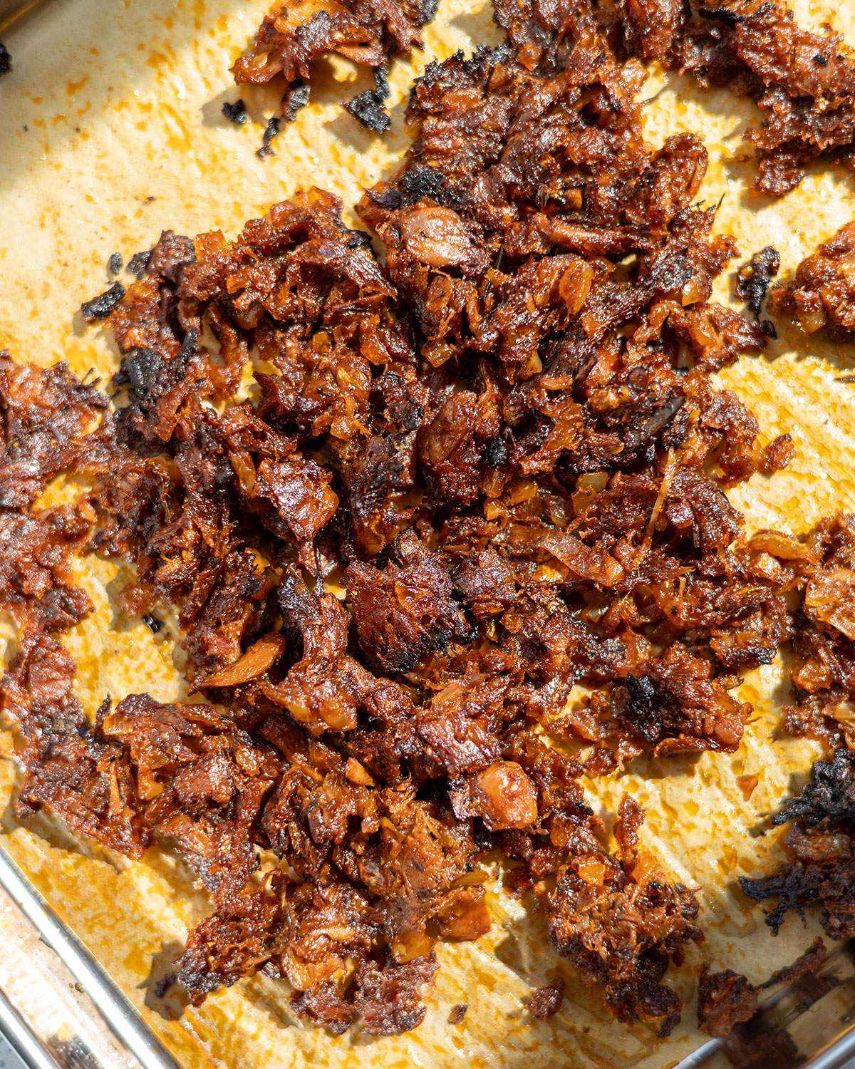 Cooked jackfruit carnitas on a tray.