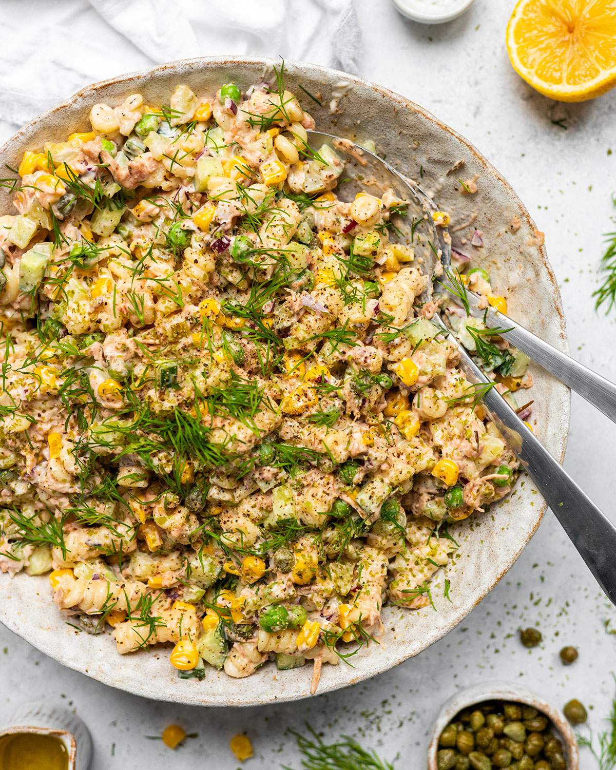A bowl full of vegan tuna salad on a table.