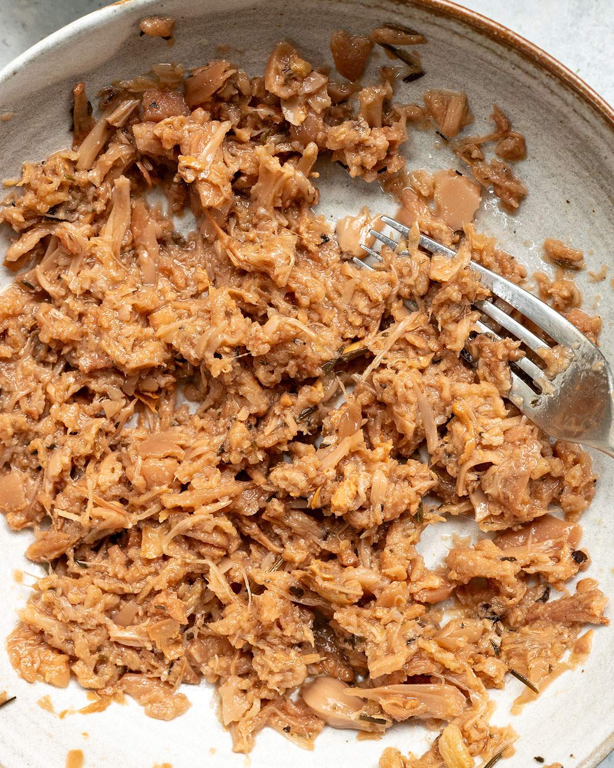 Mashed jackfruit in a bowl.