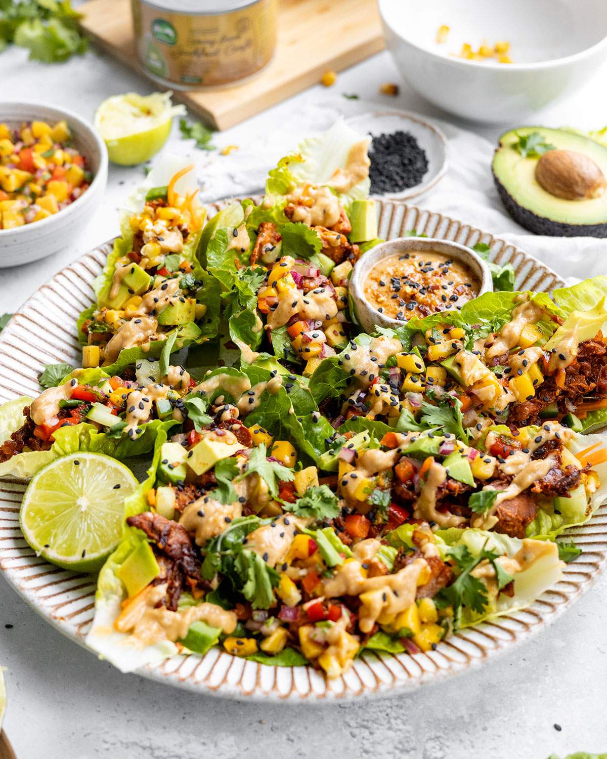 Spicy jackfruit lettuce wraps on a serving platter.