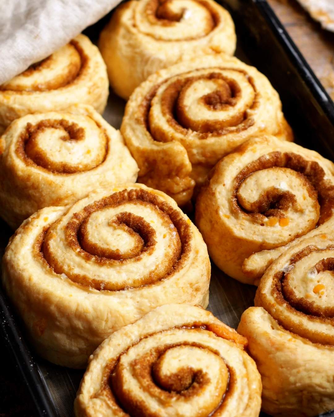 Sweet potato cinnamon rolls after the second rise.