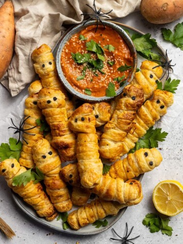Pastry Wrapped Sweet Potato Mummies on a serving platter.