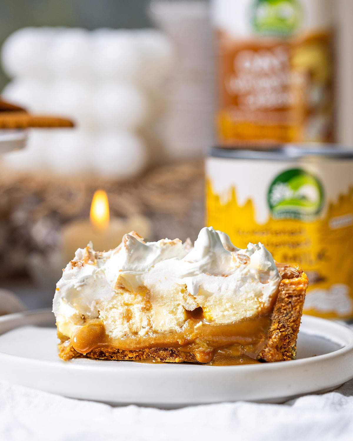 An indulgent slice of banoffee pie on a serving plate.