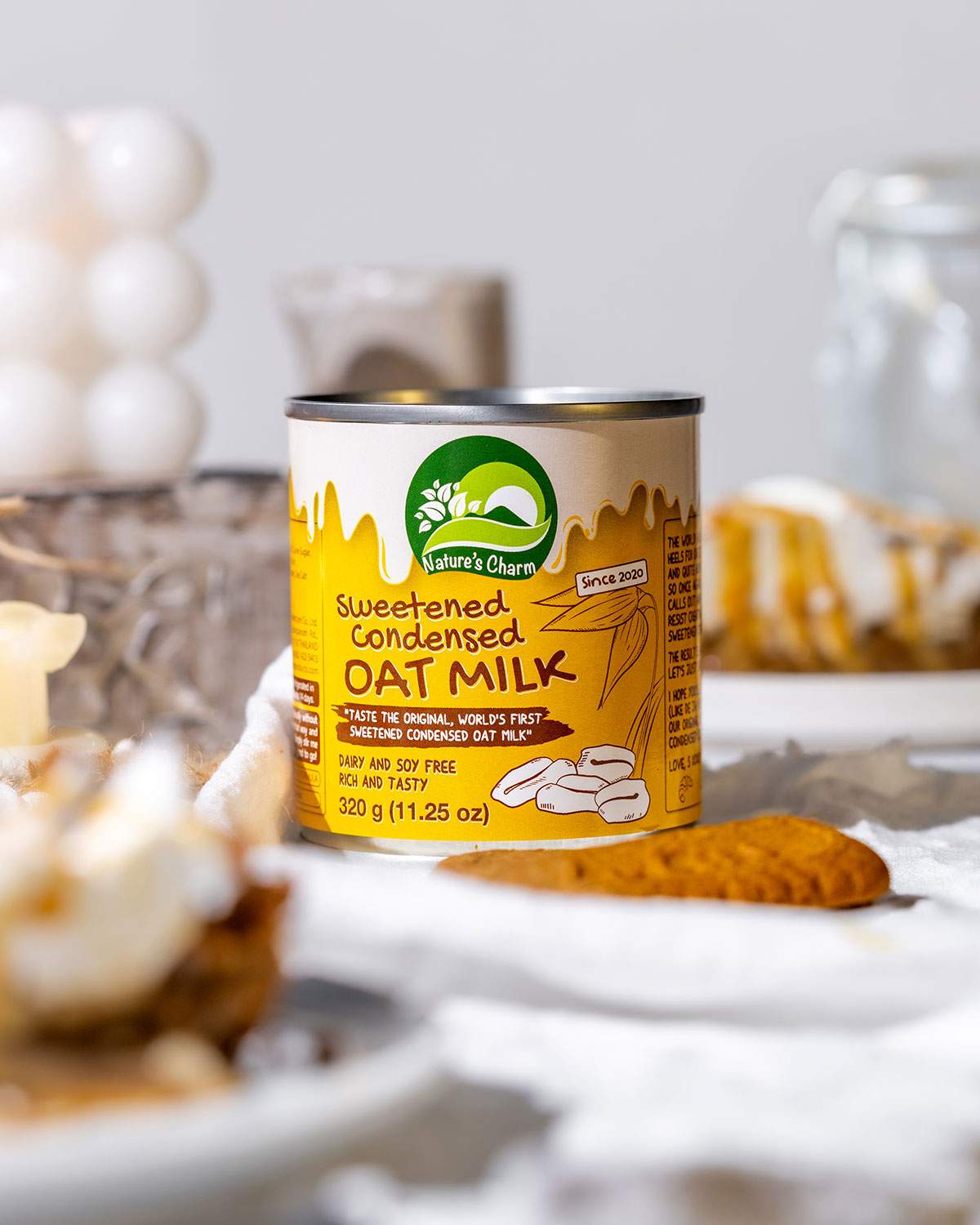 A can of Nature's Charm Sweetened Condensed Oat MIlk.