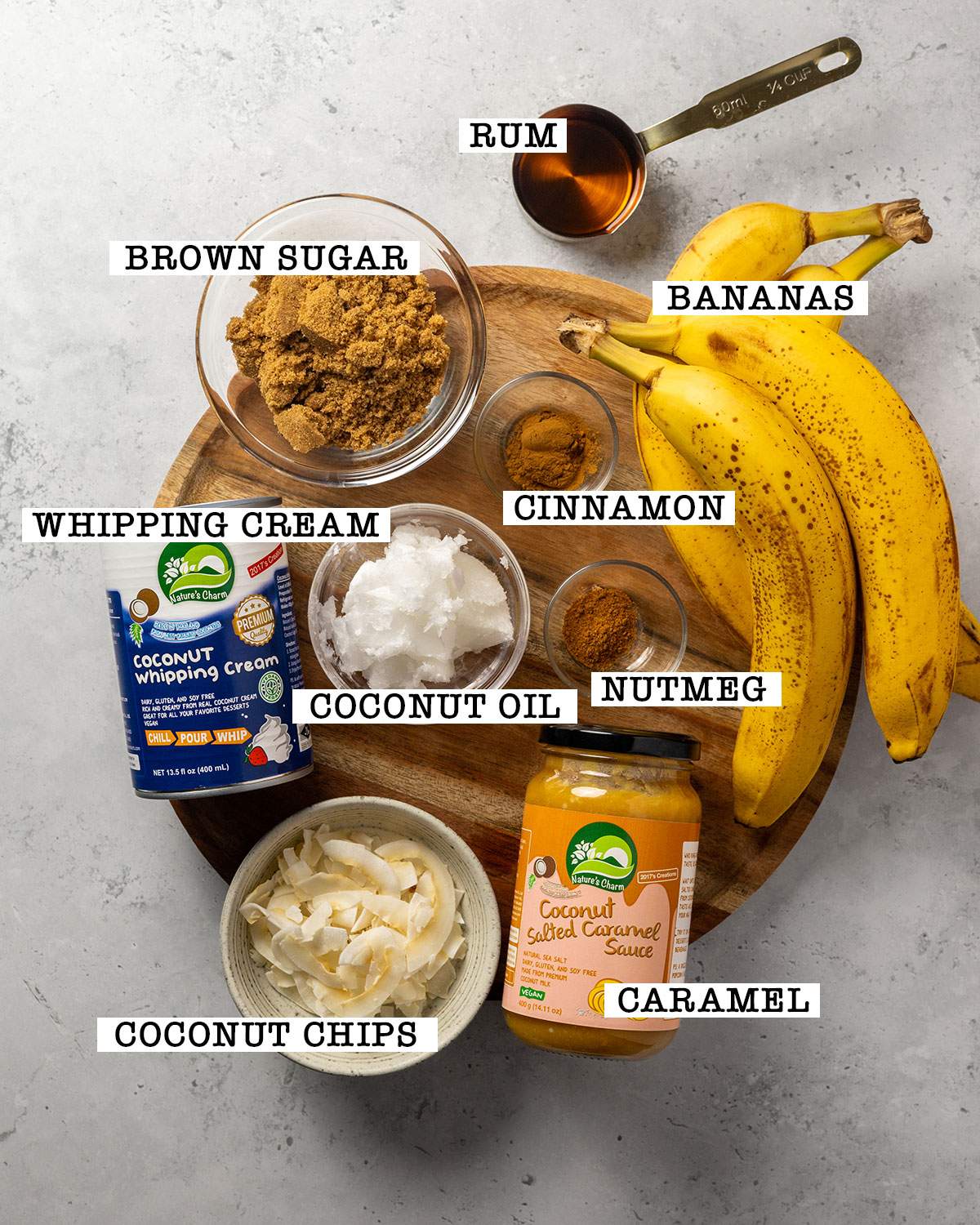 Ingredients for vegan bananas foster on a platter with labels.