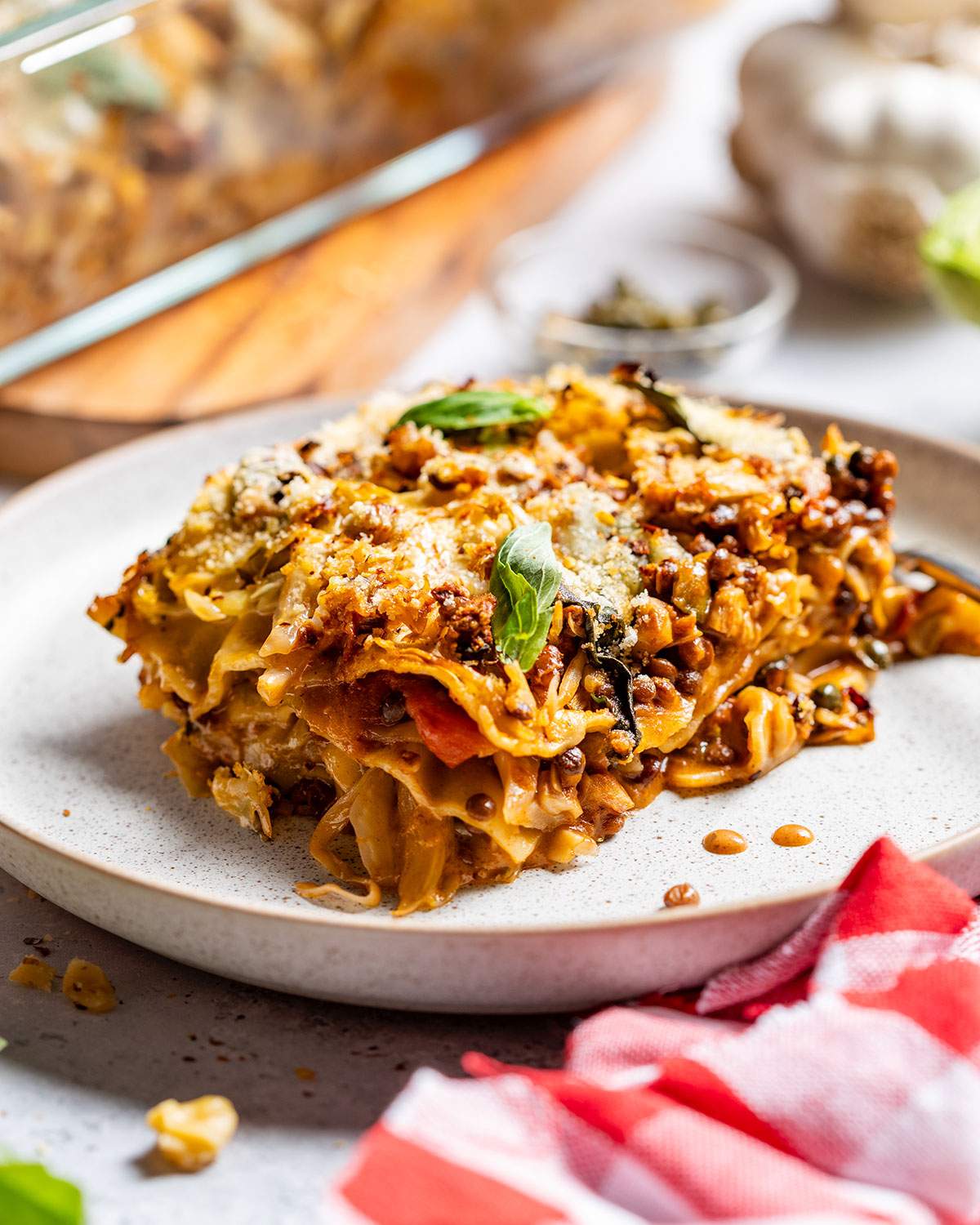 A slice of vegan cabbage lasagna on a plate.