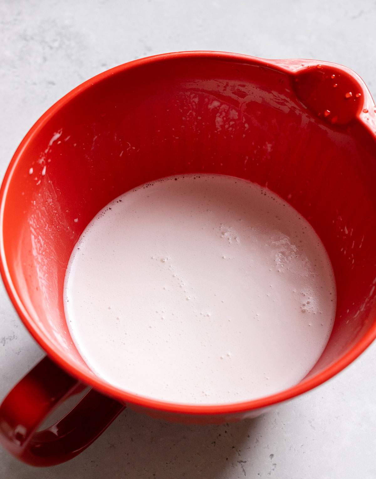 Creamy coconut cream in a mixing bowl.