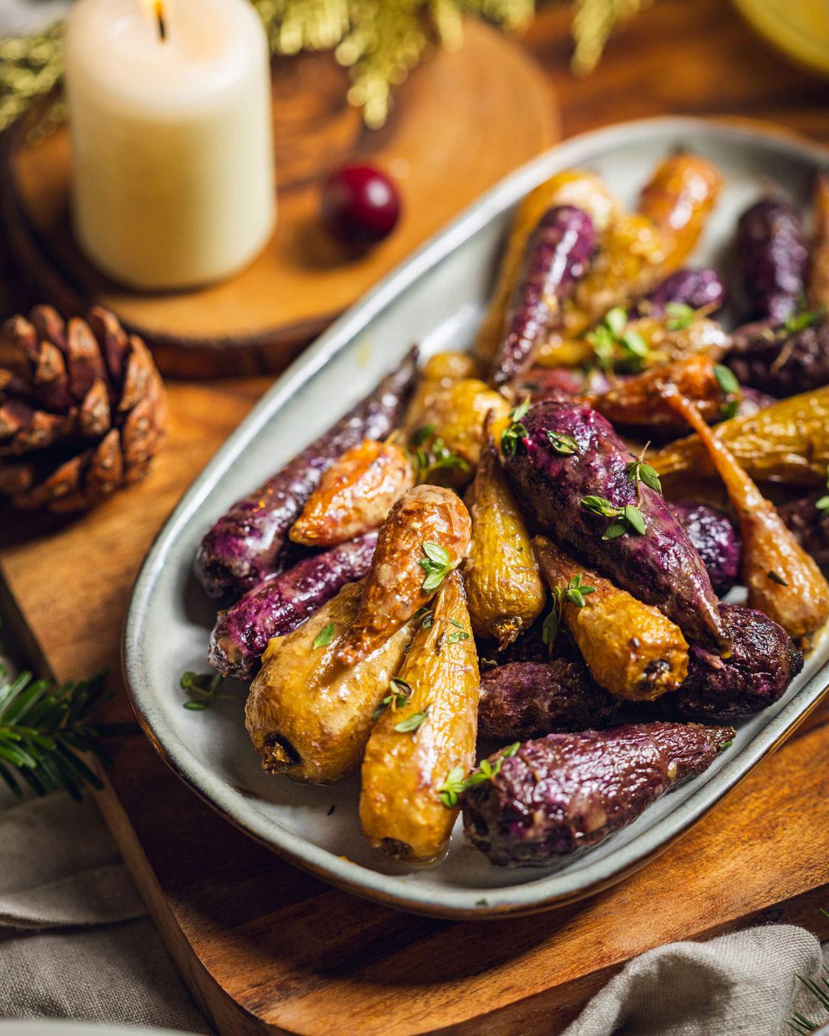 Roasted rainbow carrots on a serving tray.