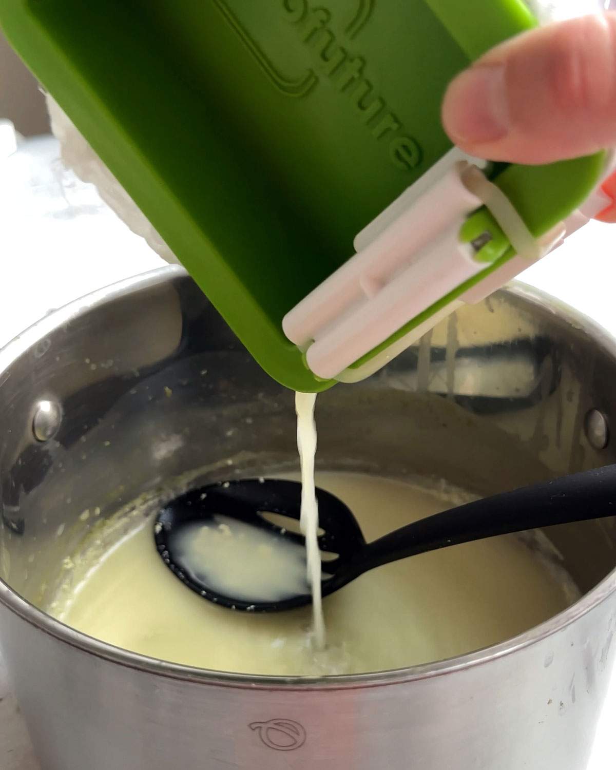 Draining liquid from a tofu press.