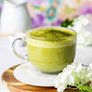 Starbucks Matcha Latte style drink in a glass mug.