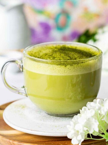 Starbucks Matcha Latte style drink in a glass mug.