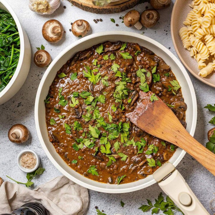 Lentil and Mushroom Stroganoff in a skillet on the table.