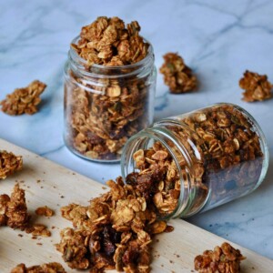 Small jars filled with cardamom granola.