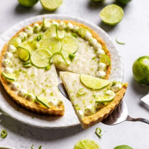 A slice being lifted from a vegan key lime pie.