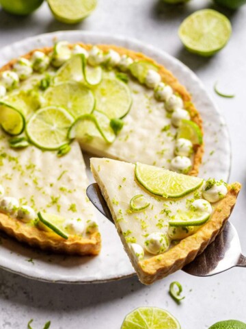 A slice being lifted from a vegan key lime pie.