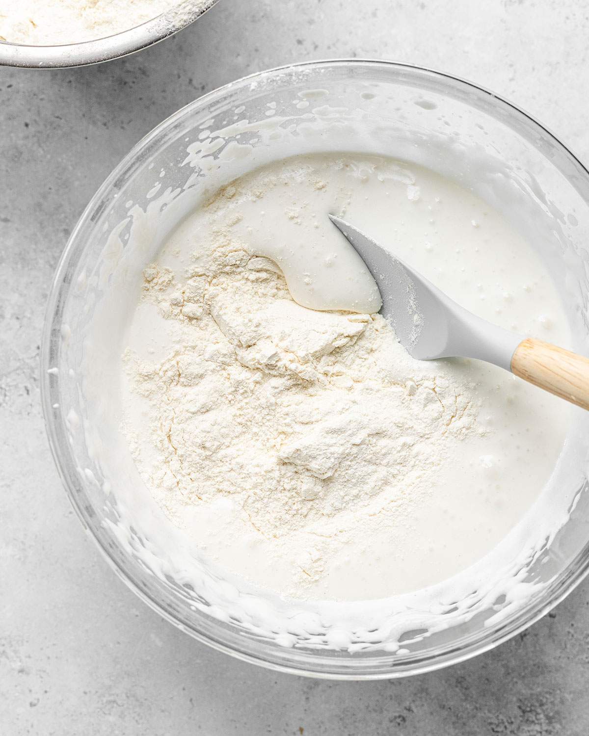 Batter for vegan ladyfingers being mixed in a bowl.
