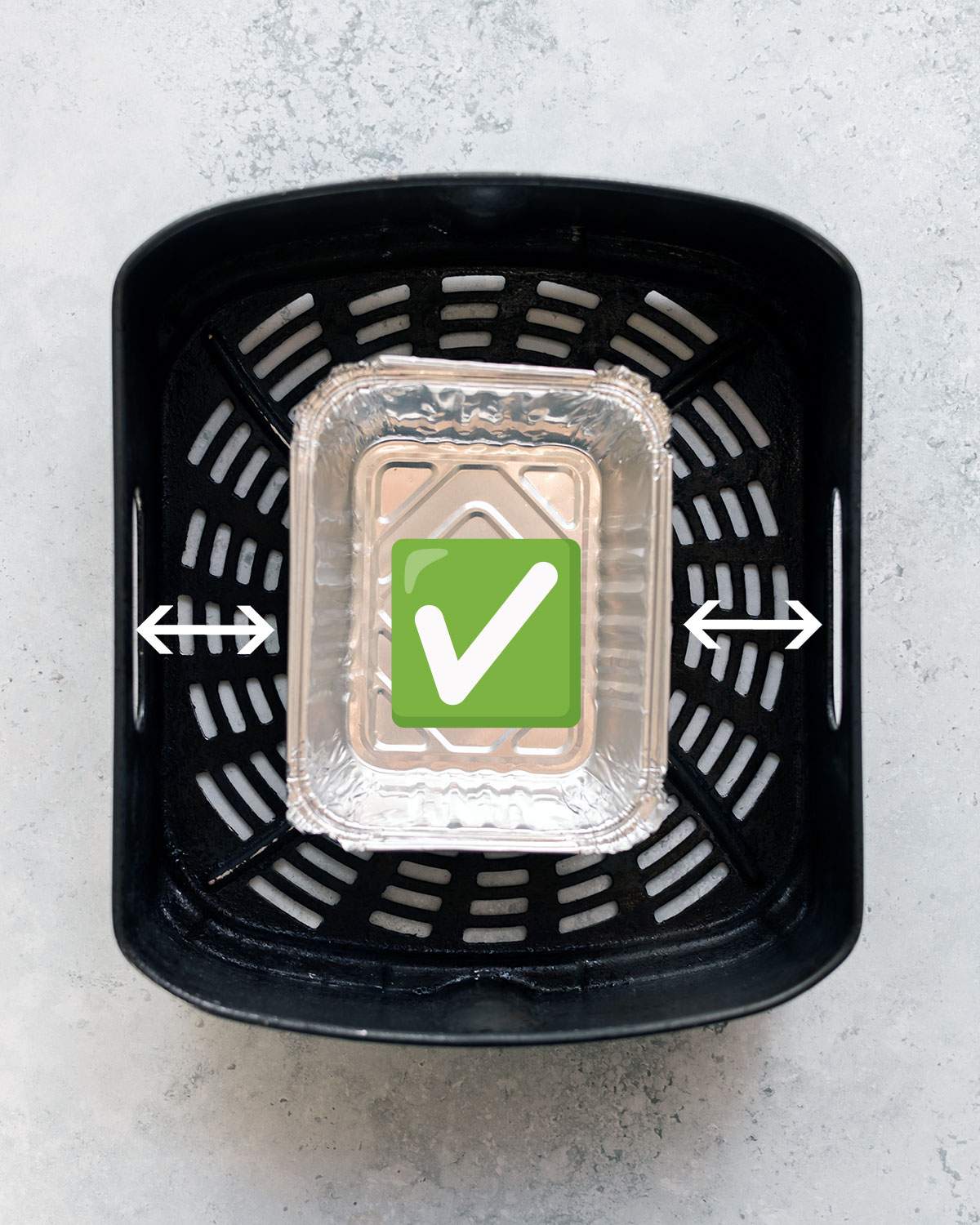 Correct use of an aluminum pan in an air fryer, leaving plenty of room and space for the air holes.
